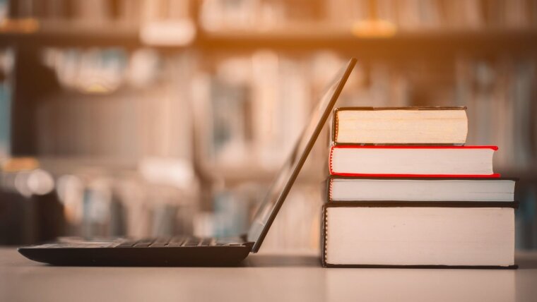 Laptop and books